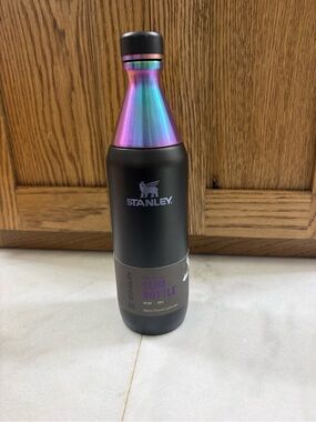 Stanley Slim Bottle in Black with Iridescent Rainbow Neck